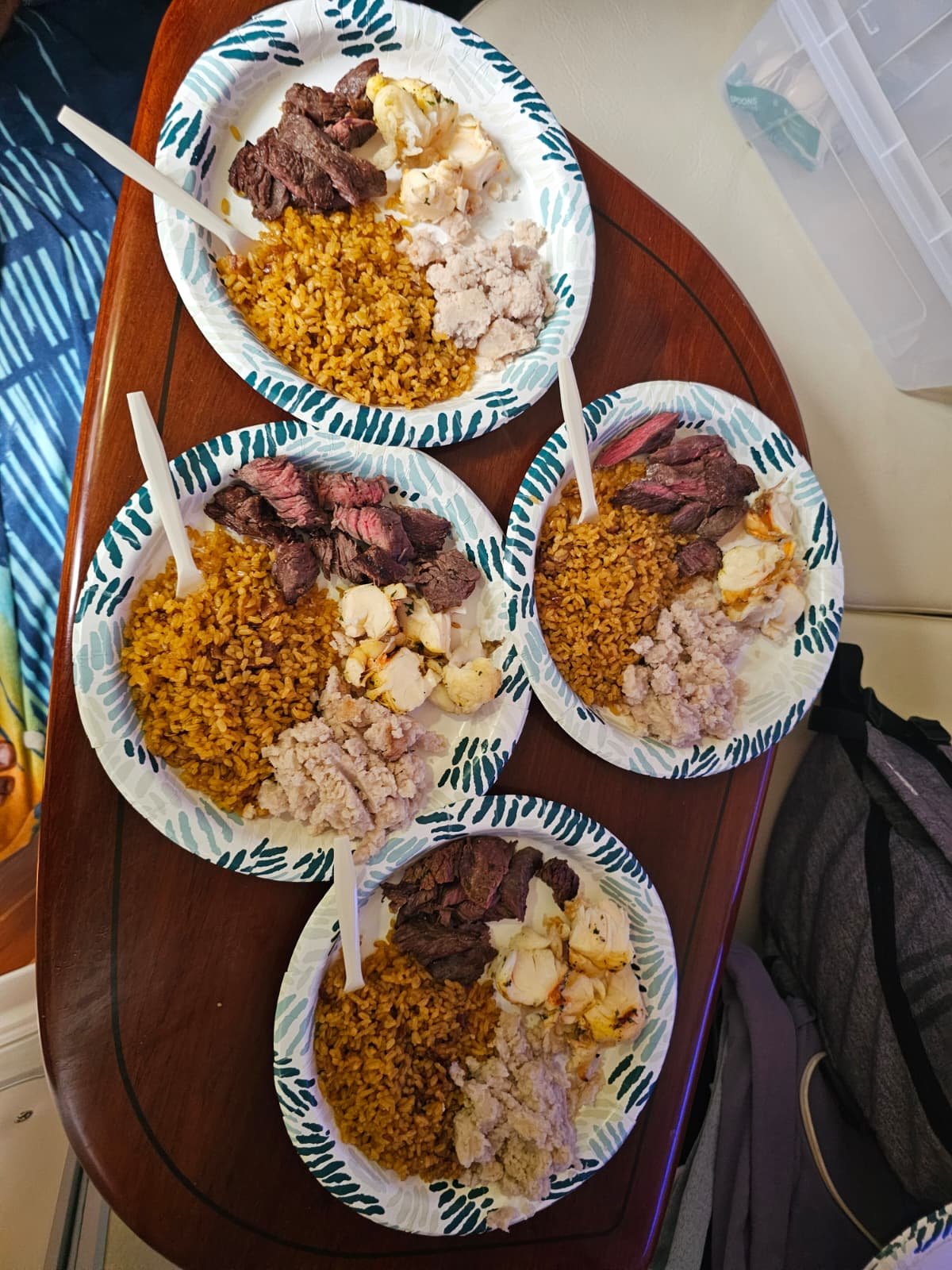 Grilled steak, seafood and rice plated for a private chef charter in Puerto Rico