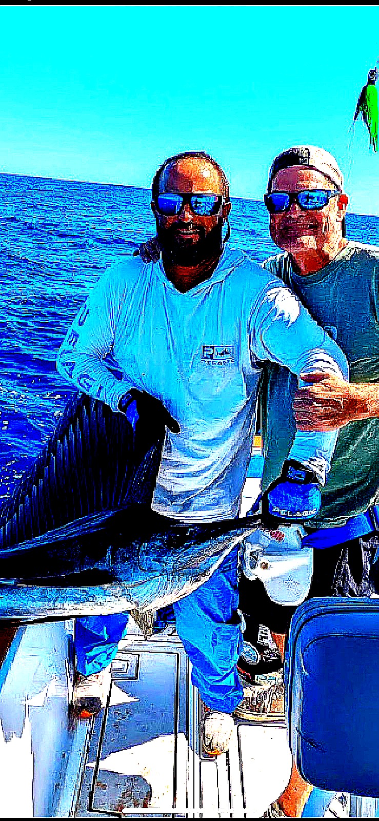 Guests holding sailfish on Bertram 31 Puerto Rico