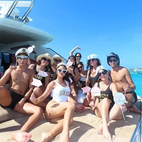 Bachelorette group celebrating on private yacht