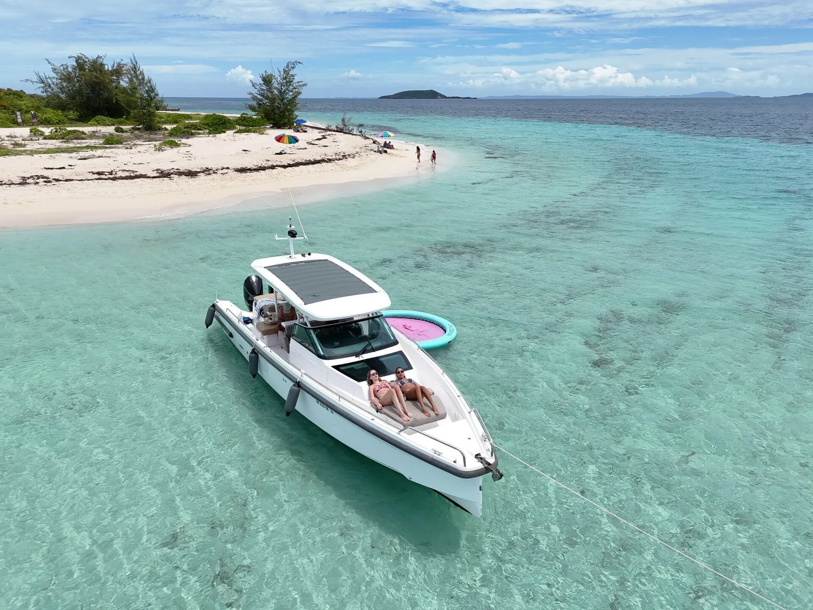 Aerial drone view of Axopar yacht anchored at private sandbar in Puerto Rico