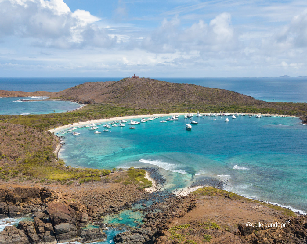 Tortuga Beach and the lighthouse on Culebrita, reachable by charter from Fajardo