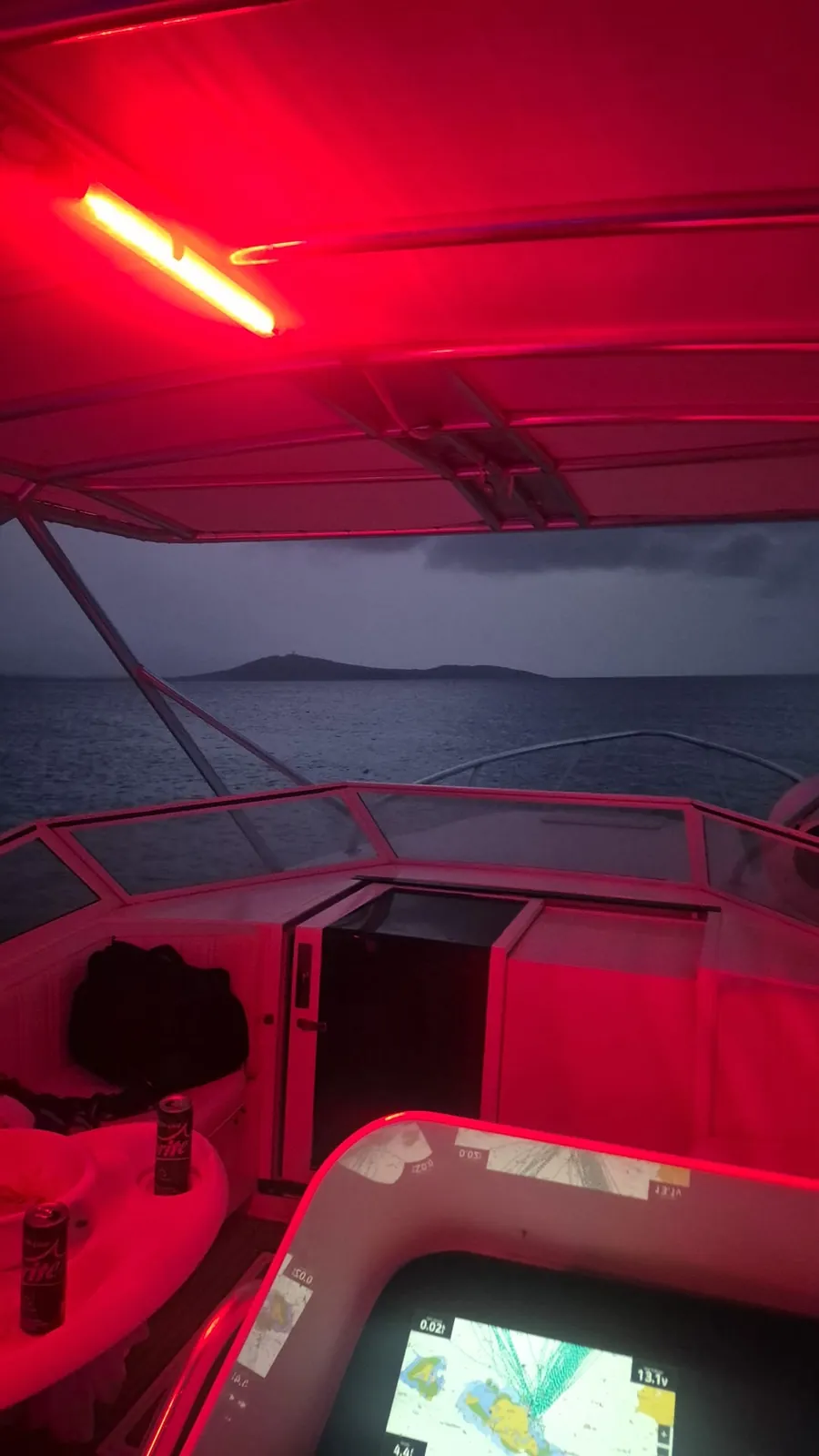Red night lighting at the helm as the boat heads out toward the islands at dusk in Fajardo Puerto Rico