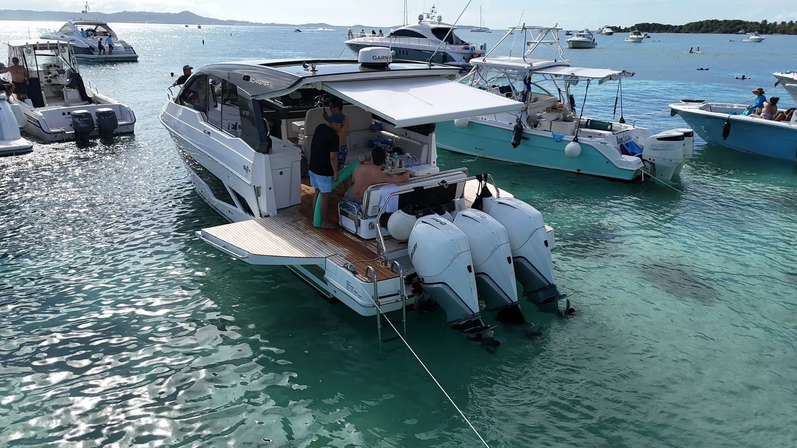 Guests on the Schaefer's teak swim platform at Palomino